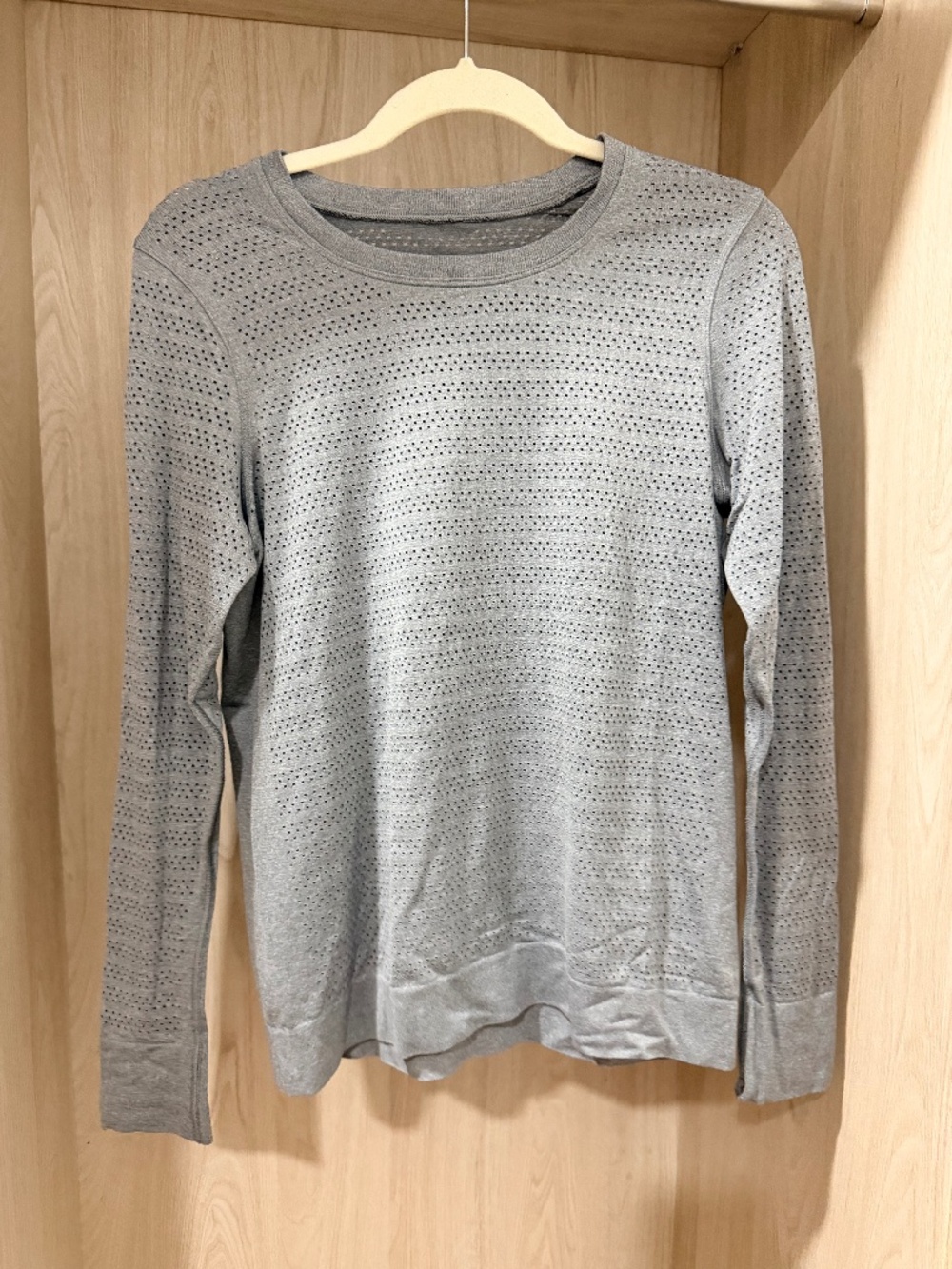 Lululemon grey long sleeve workout top. Size M